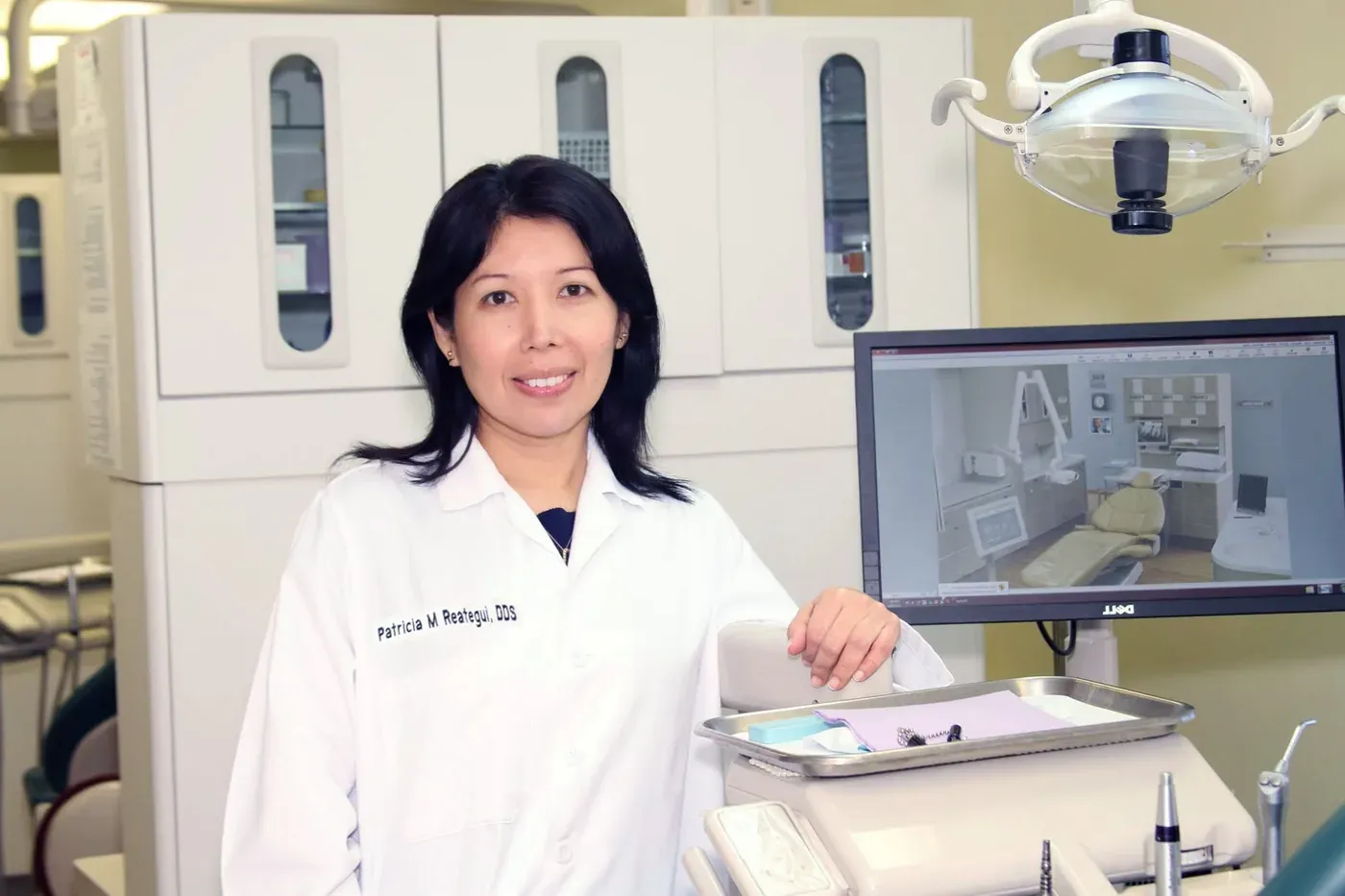 Dr. Reategui in the dental treatment room